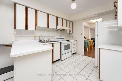 Photo 11 at 1 - 3 Reidmount Avenue, Malvern West, Toronto