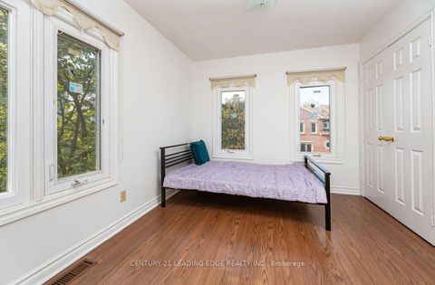 Photo 14 at 1 - 3 Reidmount Avenue, Malvern West, Toronto