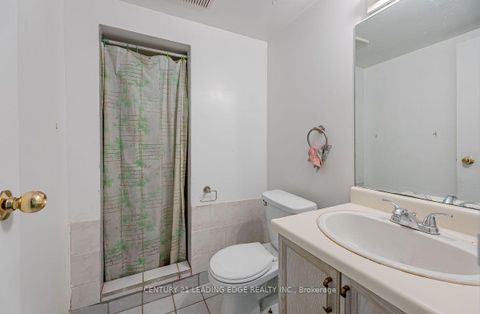 Photo 20 at 1 - 3 Reidmount Avenue, Malvern West, Toronto