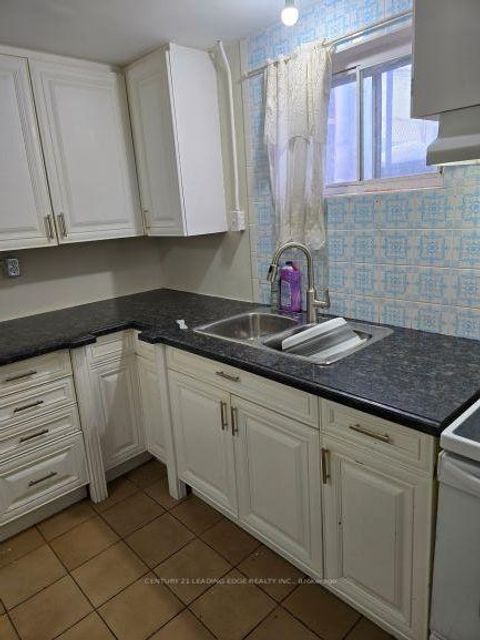 Photo 26 at 12 Bamford Crescent, Black Creek, Toronto