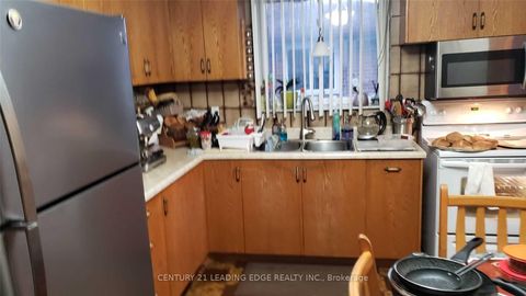 Photo 33 at 12 Bamford Crescent, Black Creek, Toronto