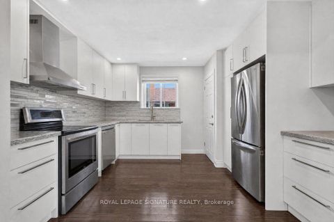 Photo 14 at 128 Trinnell Boulevard, Birchmount, Toronto