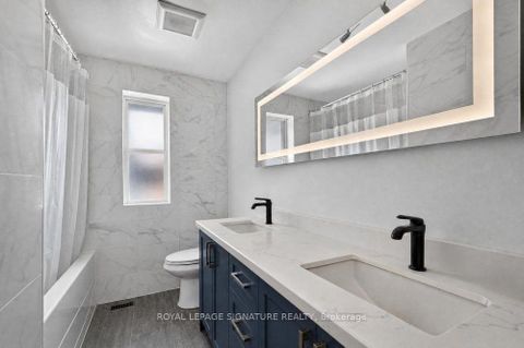 Photo 23 at 128 Trinnell Boulevard, Birchmount, Toronto