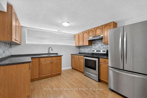 Photo 25 at 128 Trinnell Boulevard, Birchmount, Toronto