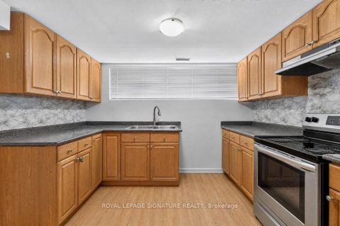 Photo 26 at 128 Trinnell Boulevard, Birchmount, Toronto