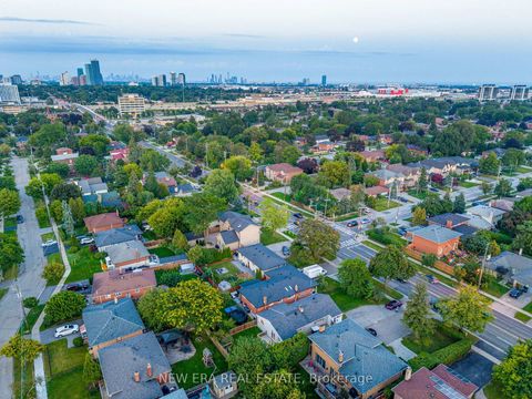 Photo 2 at 4246 Bloor Street W, Markland Wood, Toronto