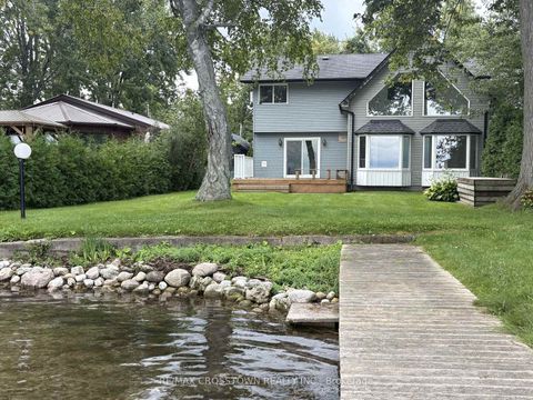 Photo 1 at 128 Moores Beach Road, Virginia, Georgina