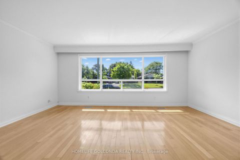 Photo 8 at 9 Moorecroft Crescent, Ionview, Toronto