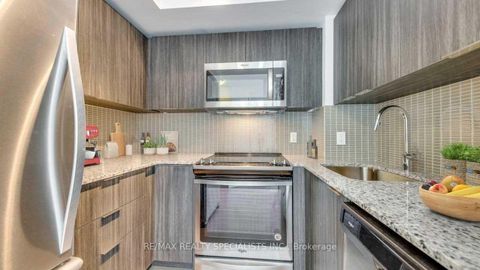 Photo 5 at 321 - 20 Shore Breeze Drive, Mimico, Toronto