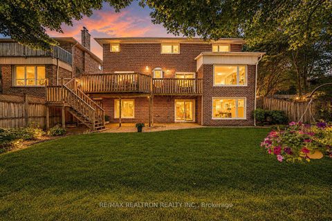 Photo 1 at 77 Mossgrove Trail, Windfields, Toronto