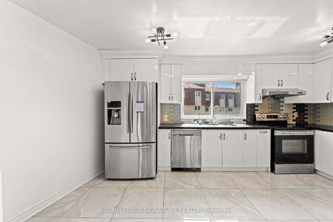 Photo 12 at 62 - 109 Jenny Wren Way, Hillcrest Village, Toronto