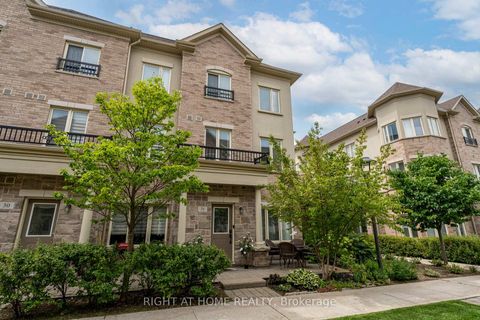Photo 1 at 31 - 27 Coneflower Crescent, Branson, Toronto