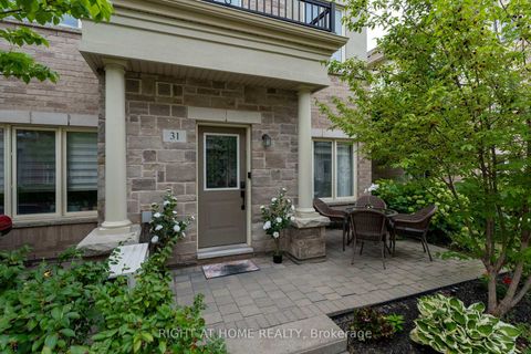 Photo 2 at 31 - 27 Coneflower Crescent, Branson, Toronto