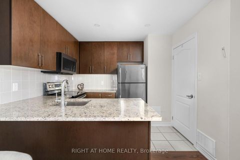 Photo 17 at 31 - 27 Coneflower Crescent, Branson, Toronto