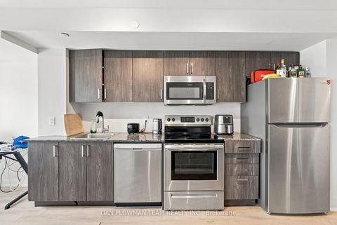 Photo 4 at 227 - 20 Meadowglen Place, Woburn, Toronto