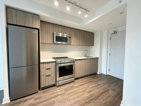 Photo 2 at 312 - 30 Samuel Wood Way, City Centre West, Toronto