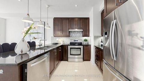 Photo 11 at 103 Alexie Way, Vellore Village, Vaughan