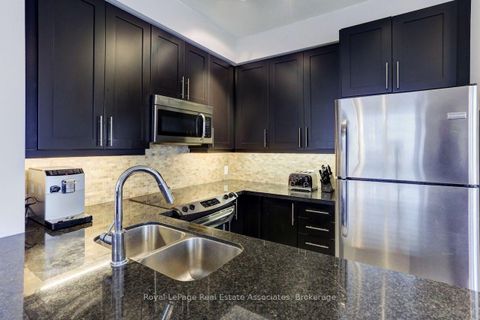 Photo 9 at 402 - 17 Ruddington Drive, Steeles, Toronto