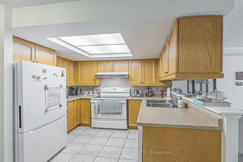 Photo 5 at 211 - 900 Bogart Mill Trail, College Manor, Newmarket