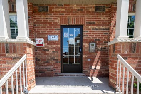 Photo 1 at 8 - 141 Isaac Devins Boulevard, Pelmo Park W5, Toronto