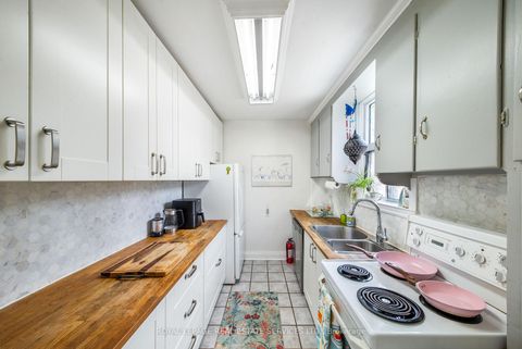 Photo 12 at 761 Kingston Road, The Beaches, Toronto