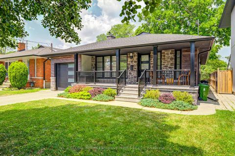 Photo 1 at 6 Cardigan Road, Queensway, Toronto