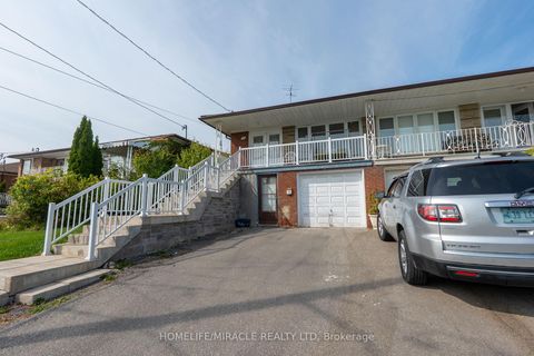 Photo 1 at 12 Brubeck Road, Humbermede, Toronto