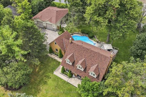 Photo 1 at 111 Whispering Pine Trail, Hills of St Andrew, Aurora