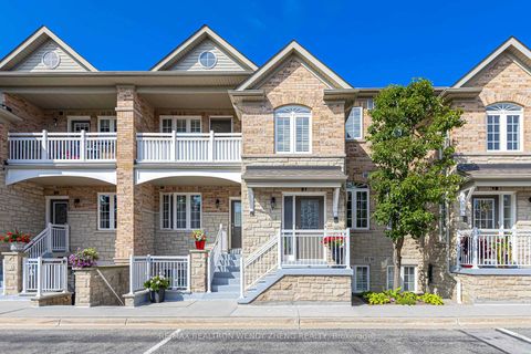 Photo 1 at 21 - 520 Silken Laumann Drive, Wyndham, Newmarket