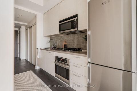 Photo 8 at 303 - 60 Haslett Avenue, The Beaches, Toronto