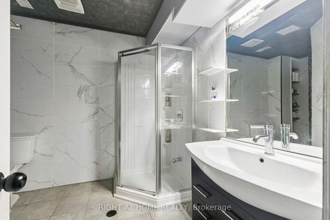 Photo 24 at 12 l'amoreaux Drive, L'Amoreaux, Toronto