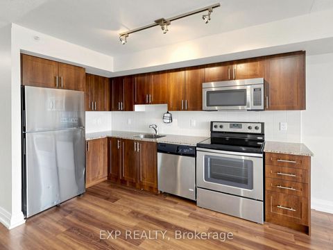 Photo 3 at 415 - 3520 Danforth Avenue, Oakridge, Toronto