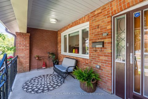 Photo 1 at 397 Strathmore Boulevard, Danforth, Toronto