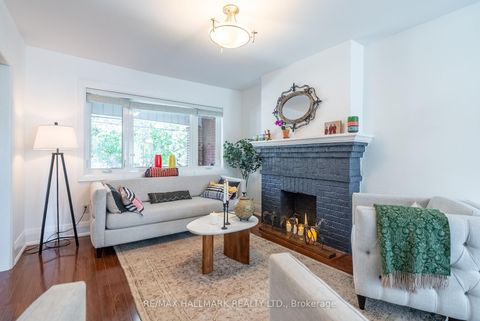 Photo 2 at 397 Strathmore Boulevard, Danforth, Toronto