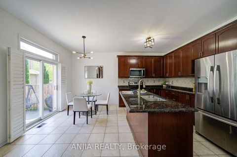 Photo 13 at 173 Russell Jarvis Drive, Legacy, Markham