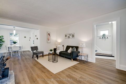 Photo 1 at 14 Sutherland Avenue, Crescent Town, Toronto