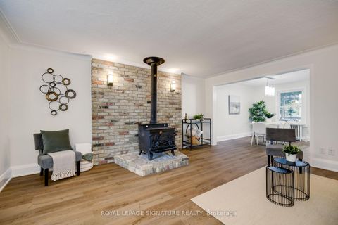 Photo 2 at 14 Sutherland Avenue, Crescent Town, Toronto