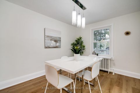 Photo 4 at 14 Sutherland Avenue, Crescent Town, Toronto