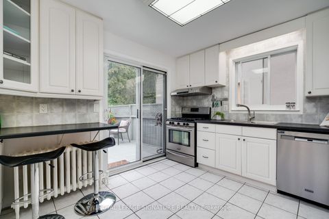 Photo 5 at 14 Sutherland Avenue, Crescent Town, Toronto