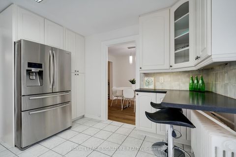 Photo 6 at 14 Sutherland Avenue, Crescent Town, Toronto