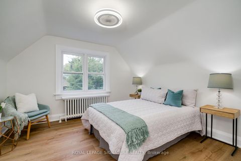 Photo 7 at 14 Sutherland Avenue, Crescent Town, Toronto