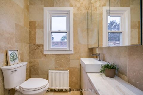 Photo 9 at 14 Sutherland Avenue, Crescent Town, Toronto