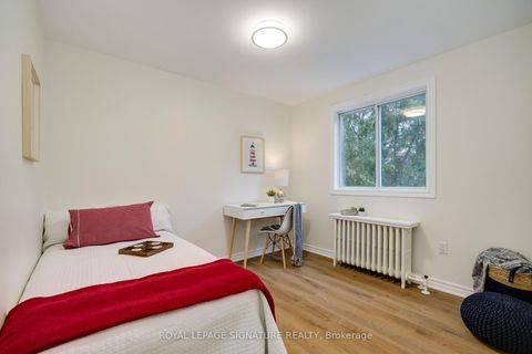 Photo 10 at 14 Sutherland Avenue, Crescent Town, Toronto