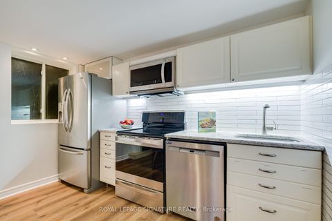 Photo 15 at 14 Sutherland Avenue, Crescent Town, Toronto