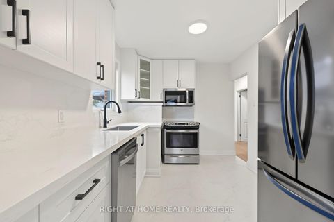 Photo 5 at 1008 Kennedy Road, Dorset Park, Toronto