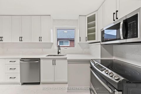 Photo 7 at 1008 Kennedy Road, Dorset Park, Toronto