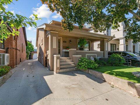 Photo 1 at 297 Strathmore Boulevard, Danforth, Toronto