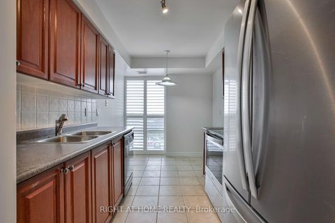 Photo 7 at 626 - 18 Mondeo Drive, Dorset Park, Toronto