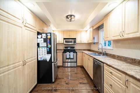 Photo 7 at 53 McClenny Drive, Aurora Highlands, Aurora