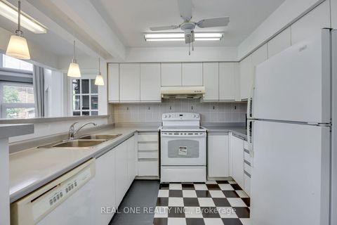 Photo 12 at 71 Stock Avenue, City Centre West, Toronto